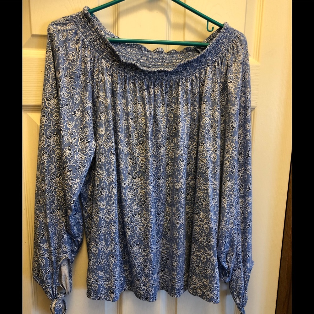 Chaps off shoulder top with tie sleeves.